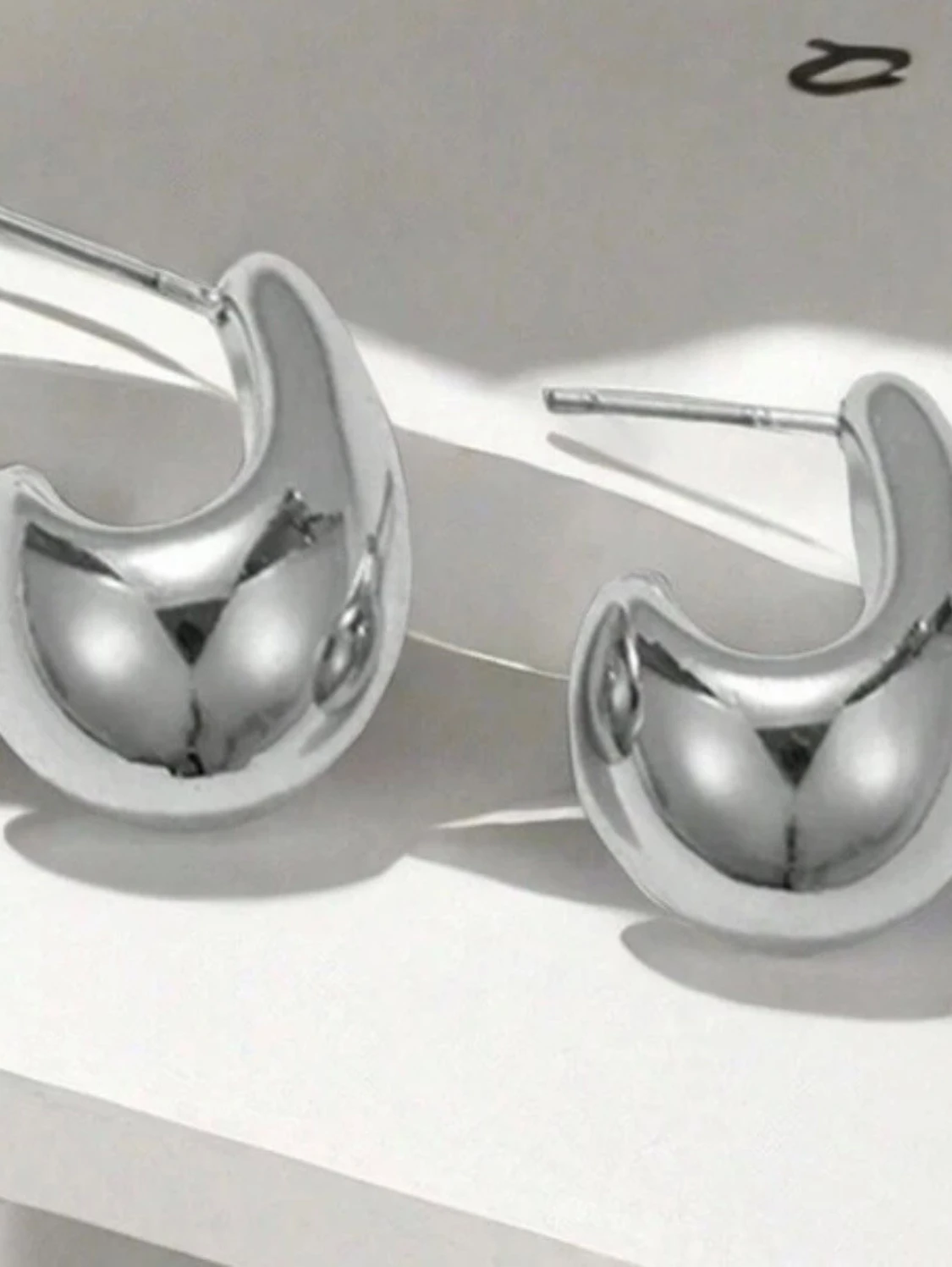  silverfärgade örhängen - 1