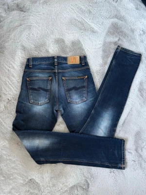 Nudie jeans denim - Riktig feta jeans från Nudie med skön fade.    W29 L32 | har mått, om man vill ha.