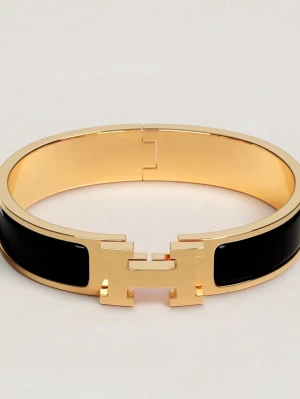 H-armband, svart  - Svart och guldfärgat