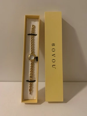 Bovou klocka - Ny och oanvänd. Tillkommer verktyg till att kunna ta bort länkar.