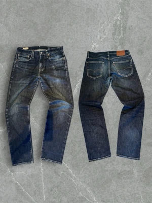 Vintage Levi's 502 - Ytterbenslängd-103cm Midja-42cm Benöppning-18cm (Straight fit jeans)