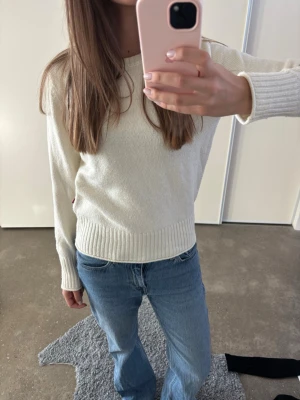 Vit stickad tröja  - Klassisk vit stickad tröja från Levis 