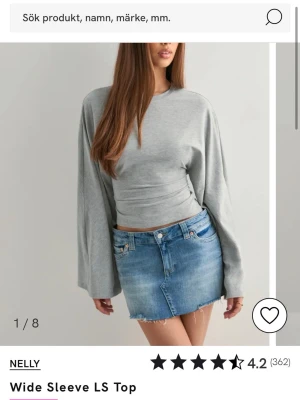 Topp - Säljer min gråa långärmade topp ifrån Nelly i storlek XS! Den är använd två gånger och har inga defekter👍🏻⭐️ Slutsåld på hemsidan