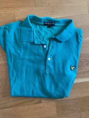 Lyle & scott piké - Turkos blå piké i Bra skick Storlek:L