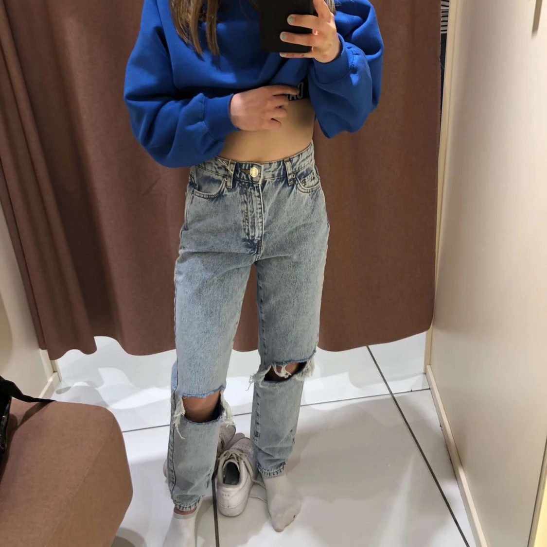 Ljusblåa Jeans med hål