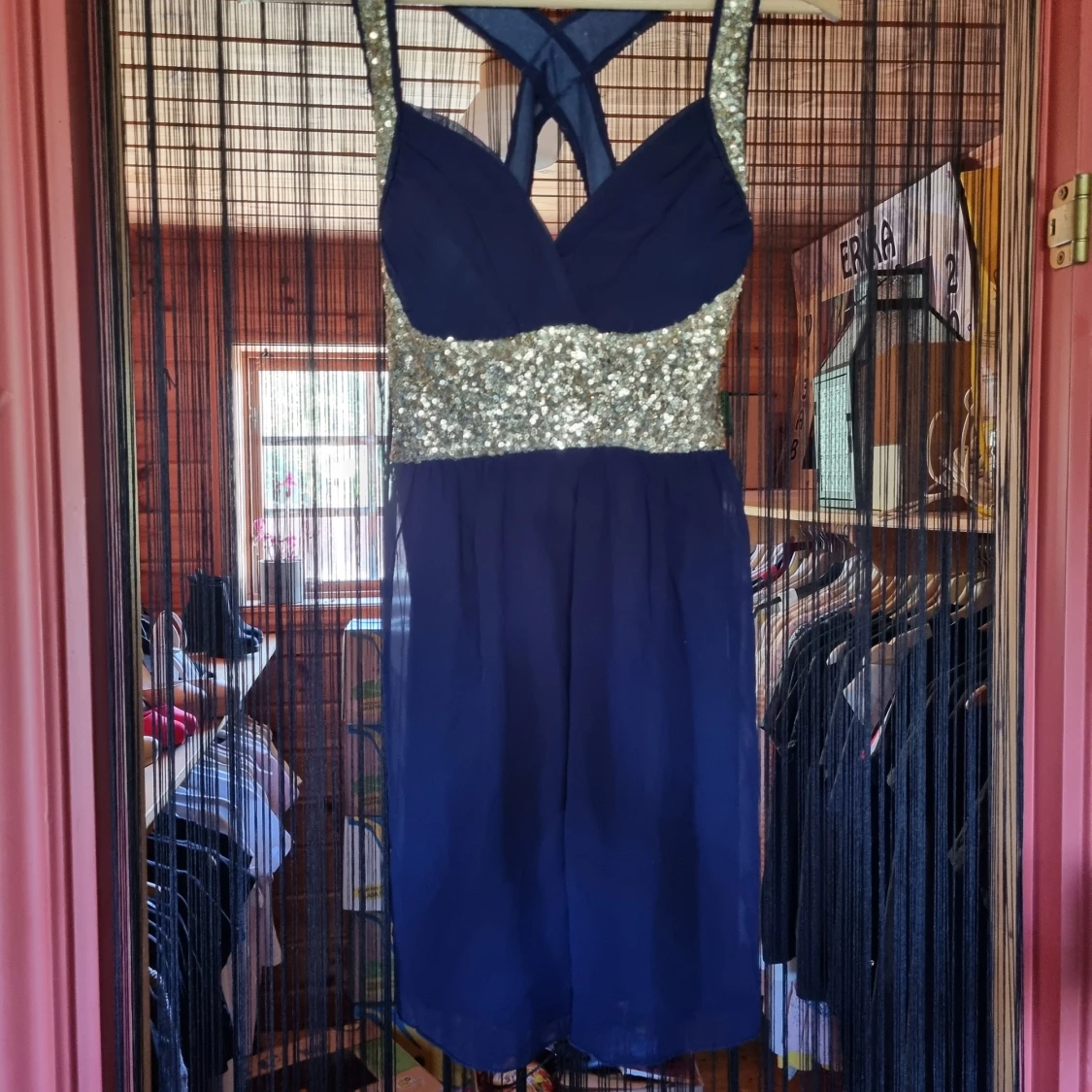 Klänning från club L