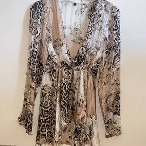 Blus - Storlek s mönstrad blus