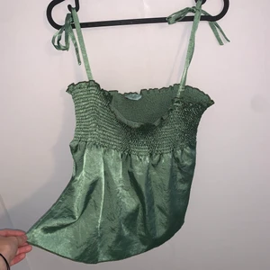 Odille oasis green satin tank top - Super cute satin green tank top with a stretchy top. Fits a size small- medium and is in perfect condition 