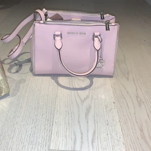 Michael Kors bags - In new condition hardly use Price is negotiable 