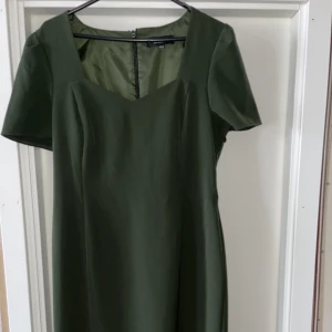 Klänning  - Oanvänd och ny  Storlek 42  