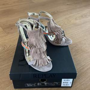 Replay tassel heels, in beige suede with blue and orange embellishments on the straps. Size EU 39. 10cm heel. Worn twice. Very good condition. Comes with original box.