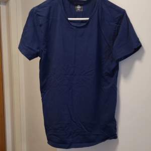 Size S lightly used in decent condition dark blue shirt 