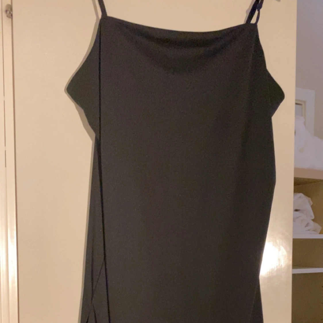 Lång svart klänning