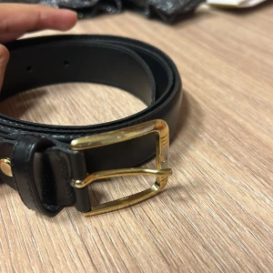 Svart bälte - Bälte. Pris kan diskuteras 