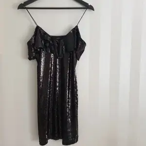 Unused mini dress with a frill at the top, no damage