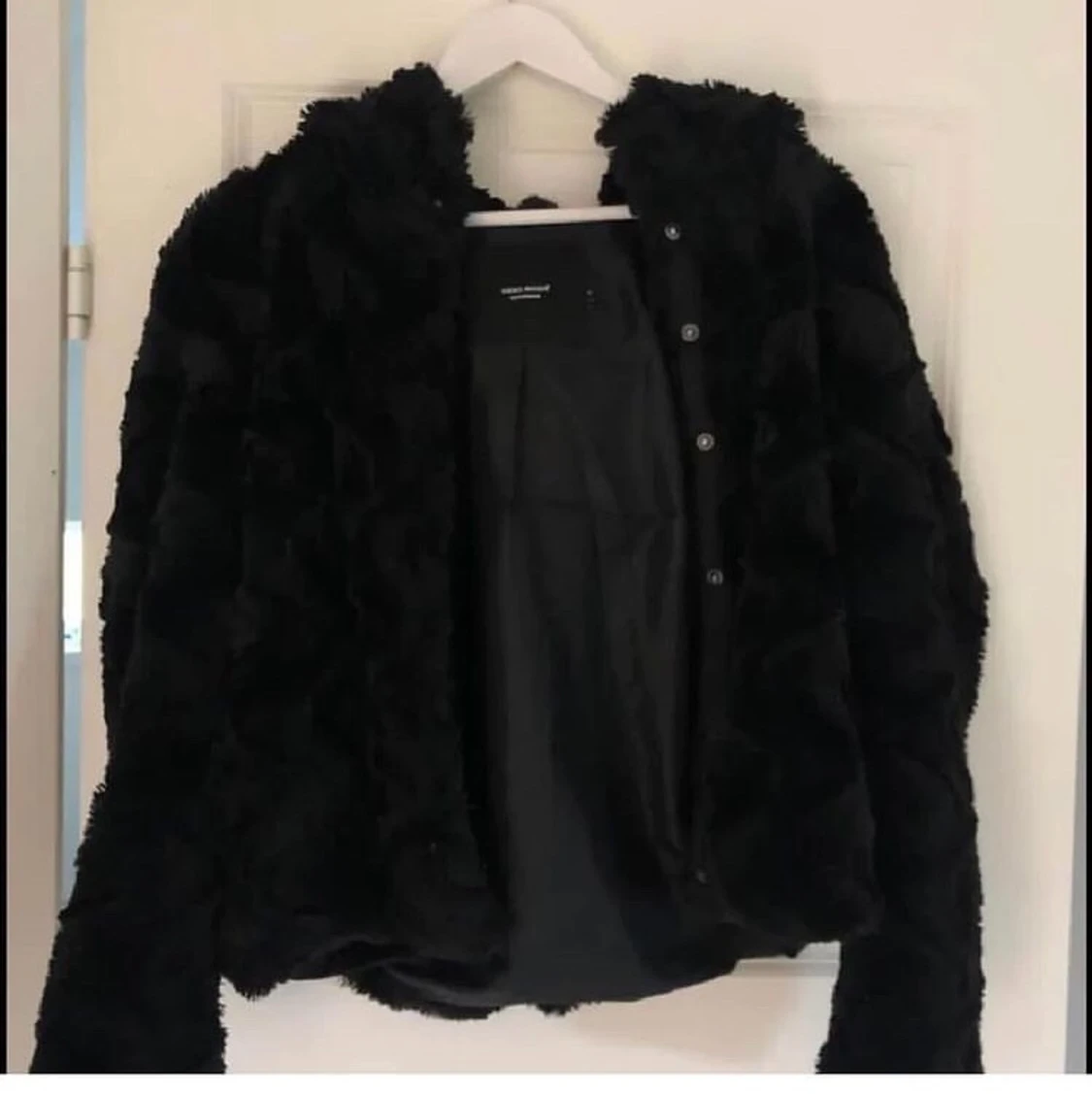 Tunn pälsjacka