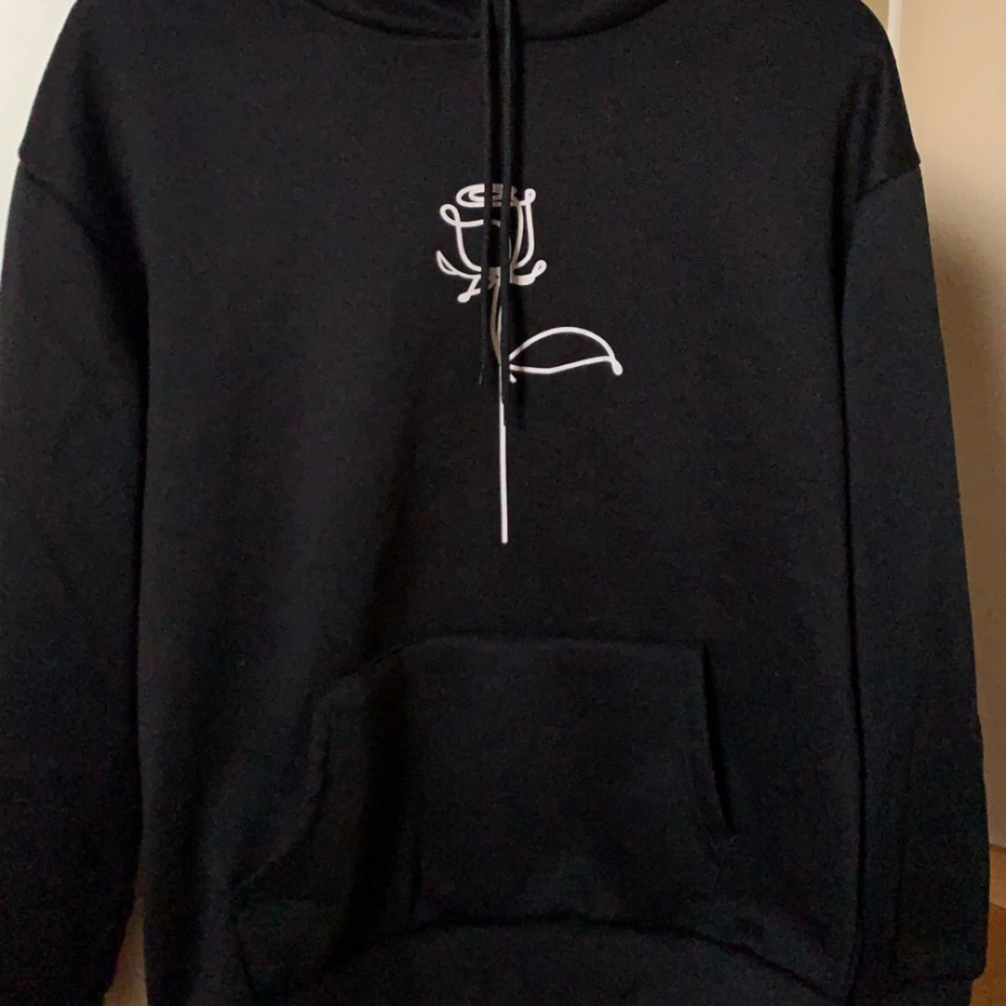 Svart hoodie