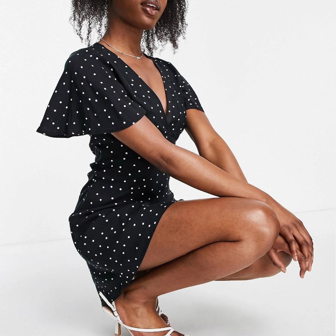 Stradivarius prickig klänning i storlek M - 90