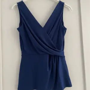 Blått linne från H&M, aldrig använd storlek S