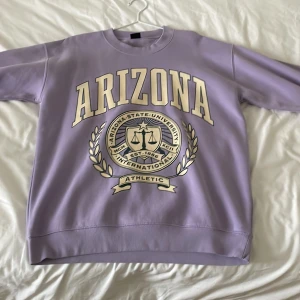 Purple Arizona Athletic Sweatshirt - Nice baggy purple sweatshirt. Rarely used and about 4 months old. Personally only selling because it does not match my color scheme.
