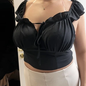 Svart topp - Svart topp. Använd en gång pga fel storlek 