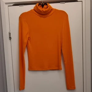 Turtleneck  - Orangea turtleneck,  endast använd en gång