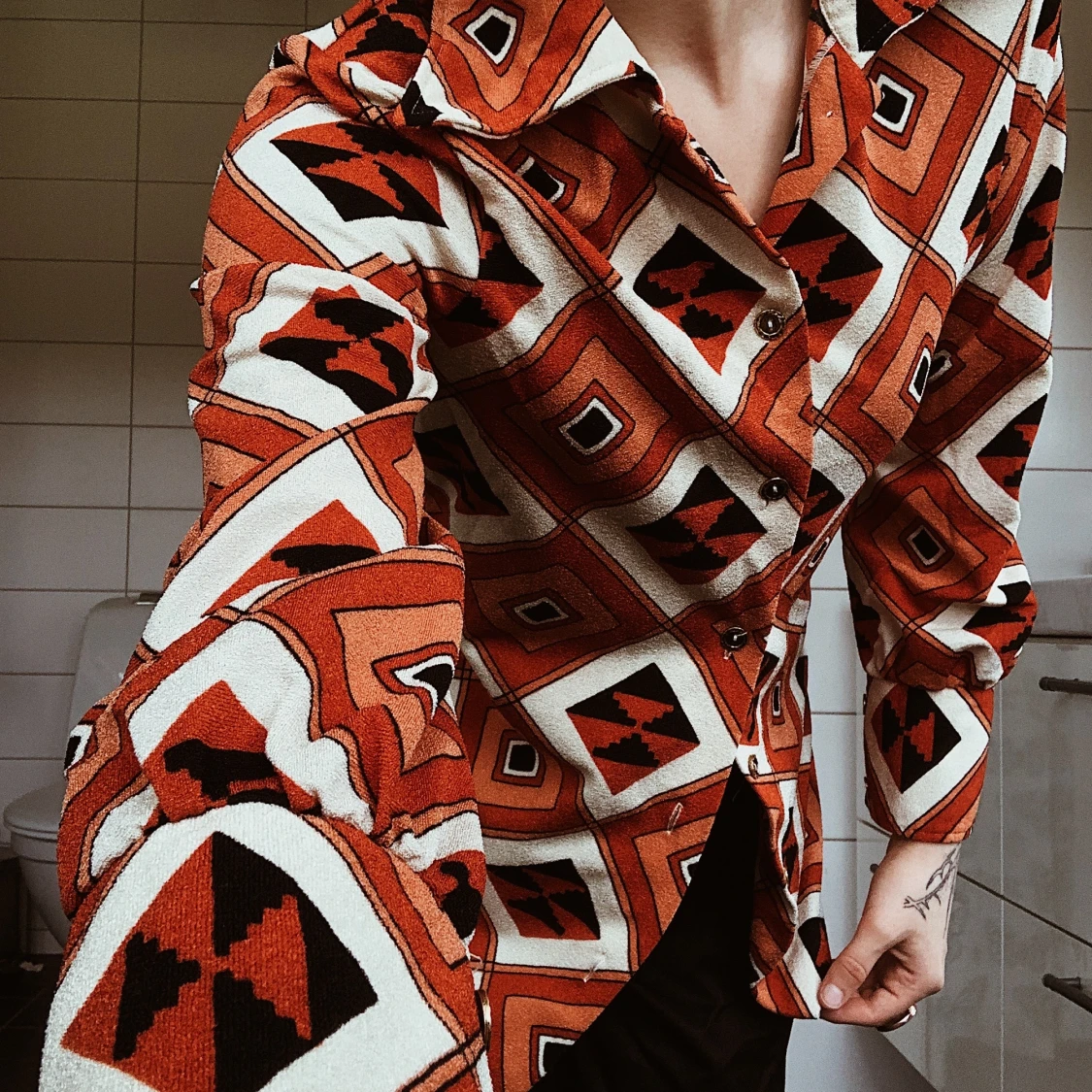 Orange mönstrad topp