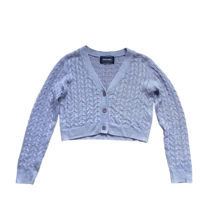 Reformation cardigan  - Lila kabelstickad cardigan från Reformation  Köpt för ca: 900kr