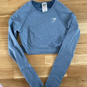 Gymshark vital seamless 2.0 long sleeve crop top - Gymshark vital seamless 2.0 crop top i färgen blue marl. (Ser av någon anledning grå ut på bild)