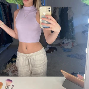 Linne - Gulligt sommar linne i ljus lila, men lite polo