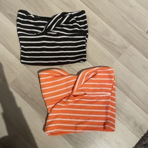 Bandeu topp - Säljer 2 stycken likadana toppar. Aldrig använda då de är lite stora på mig. Säljer båda för 60kr totalt.