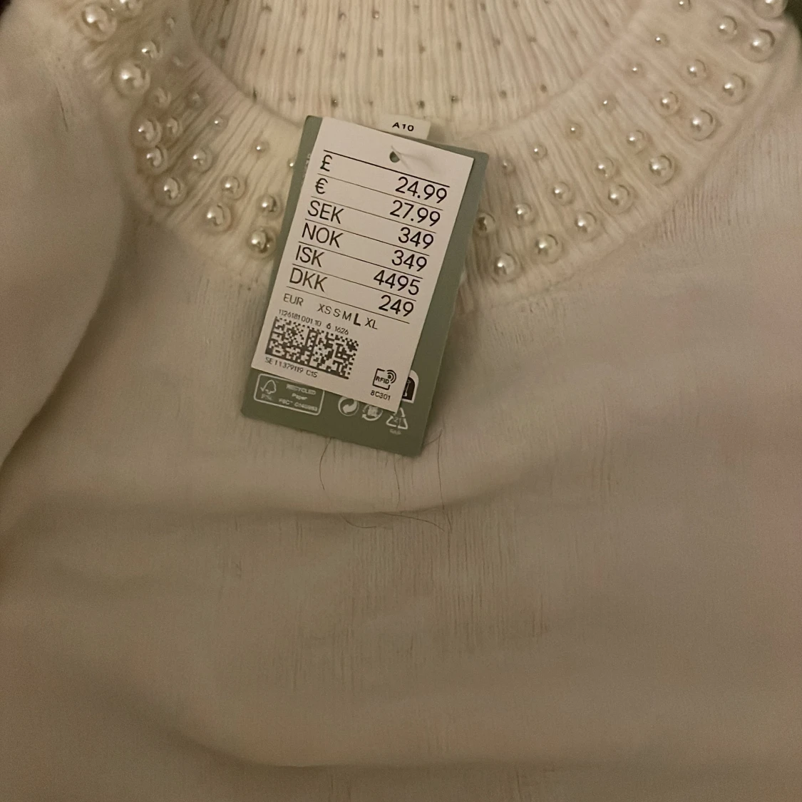 Stickad tröja med pärlor - 91