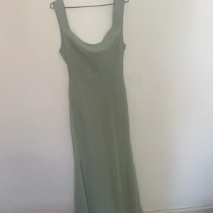 Green dress open back - New dress. Tags still on. 