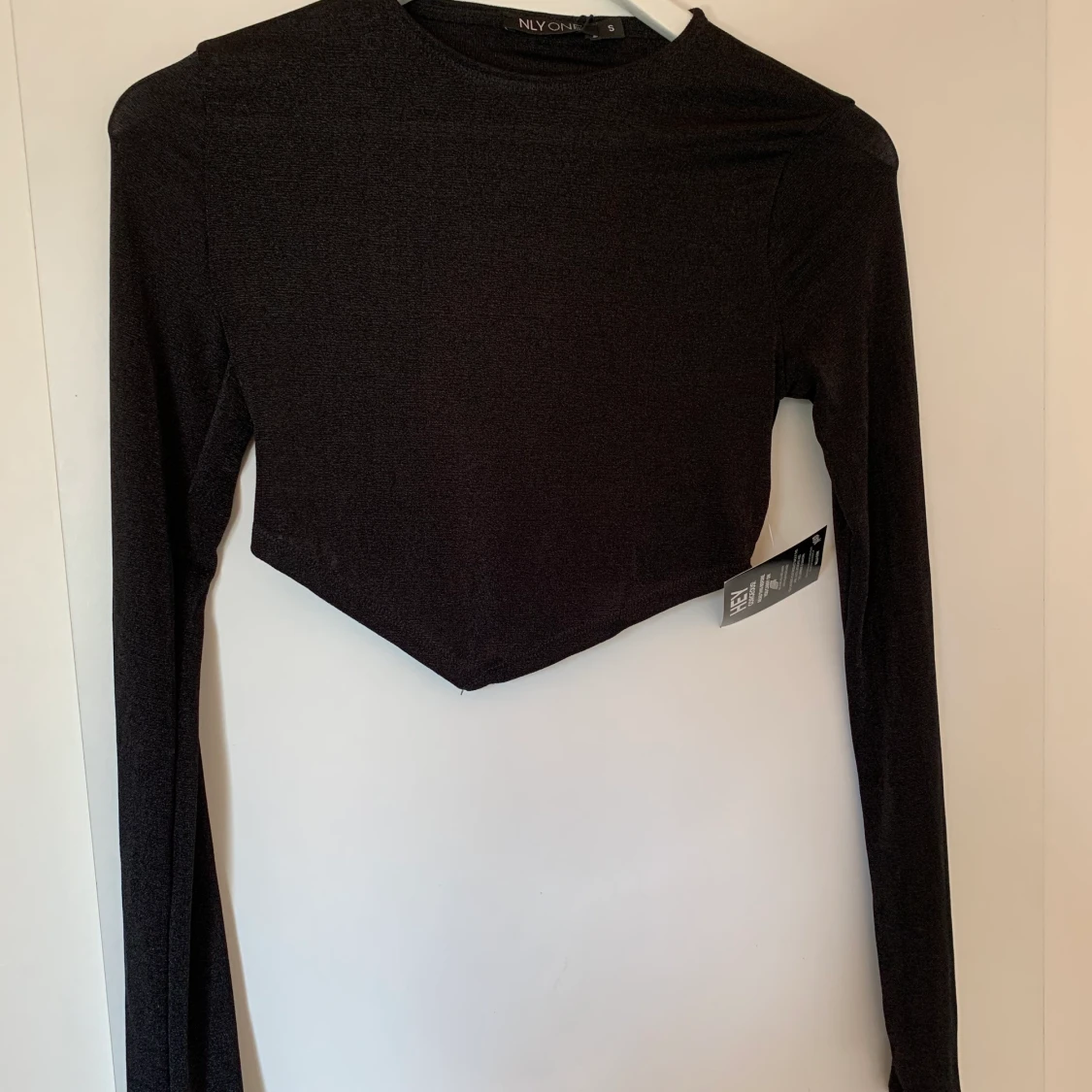 Oanvänd Nelly topp - 91