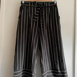 Black shorts with white stripes in very good condition. Bought in France 2 years back.   Size 36