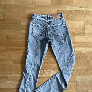 Högmidjade  Bootcut med slits