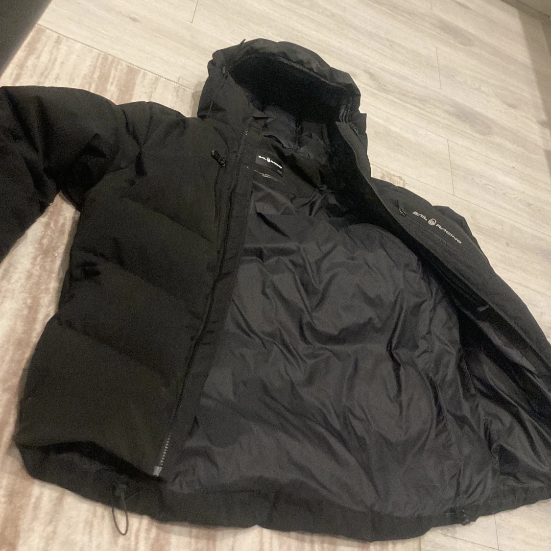 Sail racing jacka svart, storlek M