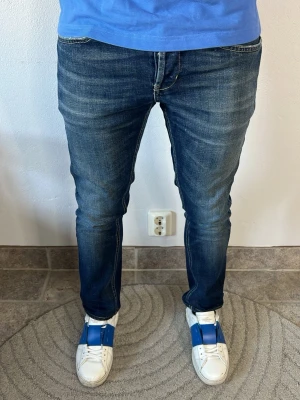 Dondup George 32 - CONDITION — 9/10 Excellent condition.  Light signs of wear.     SIZE — 32 Model is 170 cm, 67kg  MEASUREMENTS (CM) (Please refer to the last photo for measurement guide)  A — 38 cm  B — 91 cm  C — 16 cm