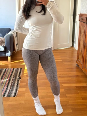 Gråa träningstights - Grå gymtights från Gymshark i XS