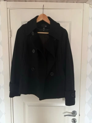 Svart Kappa - Säljer denna då den inte längre används.  Pris går att diskuteras.