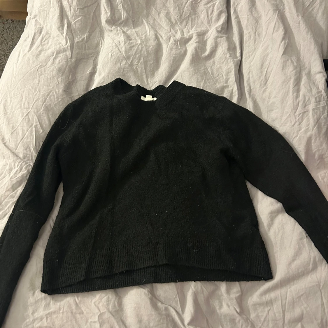 Svart stickad tröja från H&M