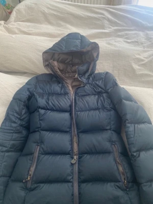 Colmar jacka  - strl 42 motsvarar xs 