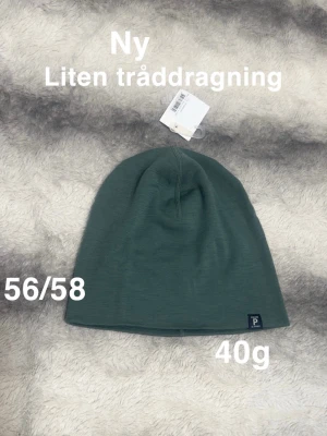 Polarn o pyret mössa - Ny med lapp men såg en liten tråddragning ( ej hål) storlek 56/58 