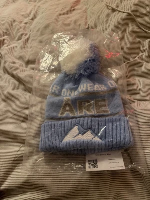Åremössa onewear - En ljusblå Åre mössa från onewear. Oanvänd 