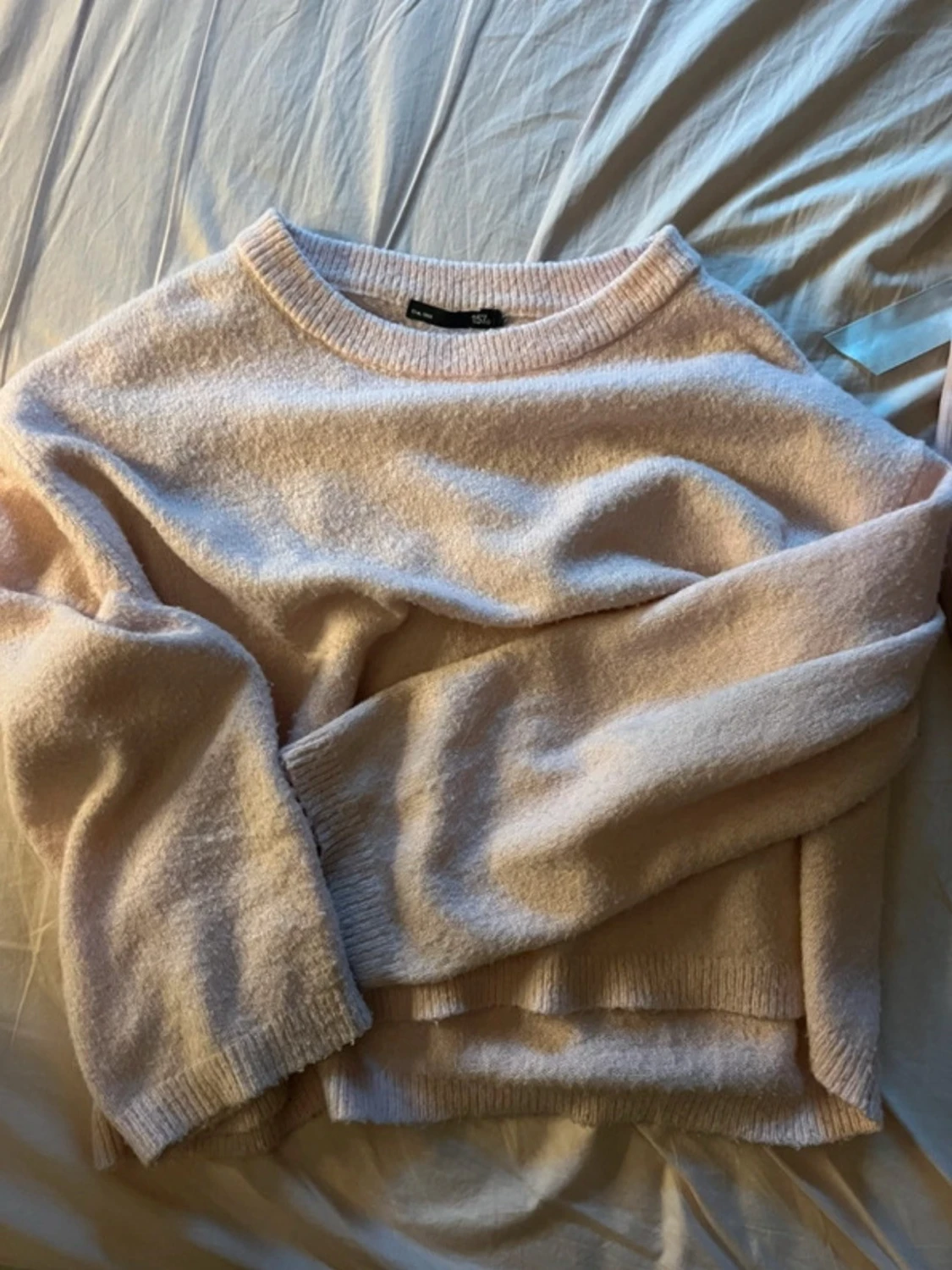 Ljusrosa stickad tröja från 157