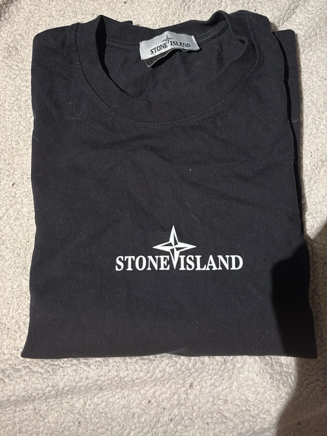 Svart Stone Island t-shirt med tryck storlek S