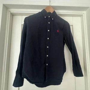 Ralph lauren skjorta - Fin Ralph lauren skjorta använd fåtal gånger. Inga defekter. 