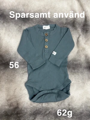 Newbie body - Sparsamt använd. Storlek 56