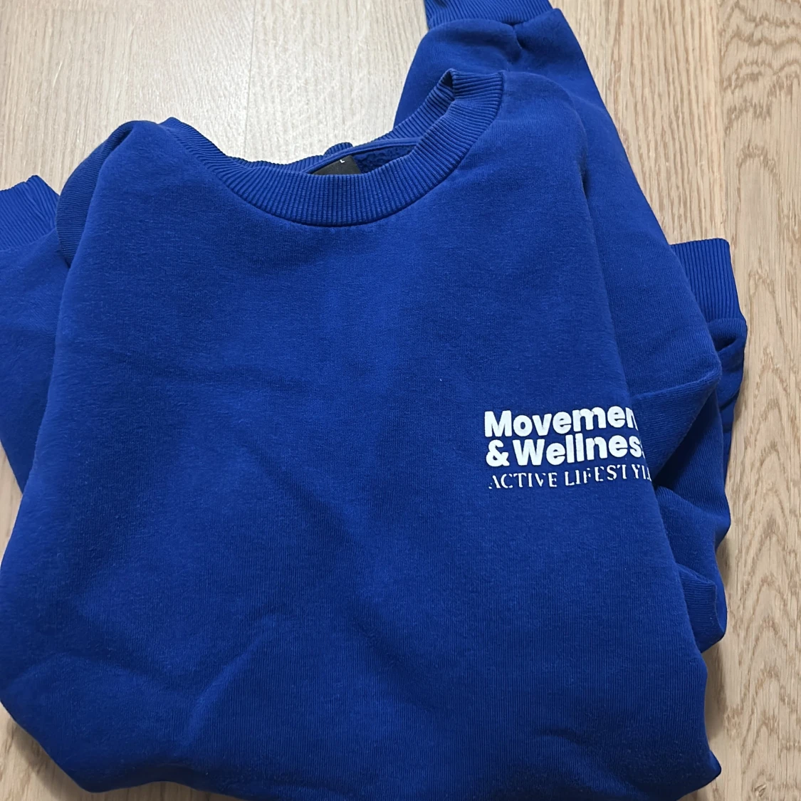 Blå sweatshirt Movement & Wellness - 1