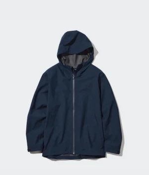 Mörkblå vindjacka Uniqlo - Snygg mörkblå vindjacka från Uniqlo, Storlek S,  skriv för fler bilder, 